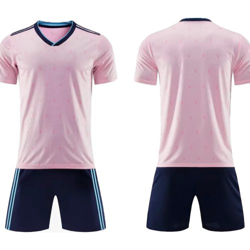 Uniforme de futbol rosado con azul navy